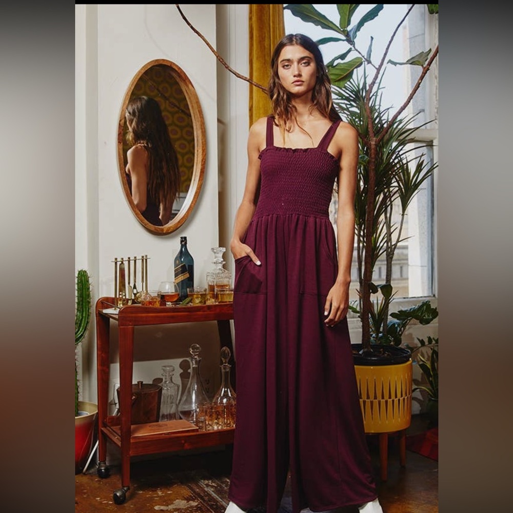 Plum colored smocked top wide leg palazzo jumpsuit stretchy and comfy